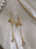 Clear butterfly dew drop earrings