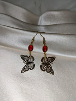 Red butterfly drop earrings