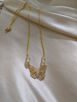 Clear bead butterfly necklace