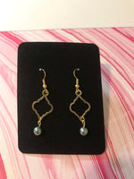 Decorative pearl drop earrings